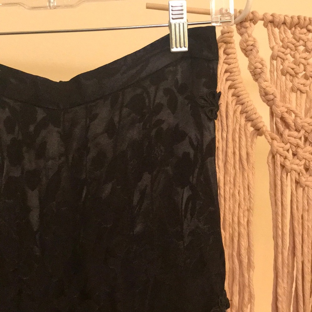 Chrissy Teigen high-waisted wise leg pants